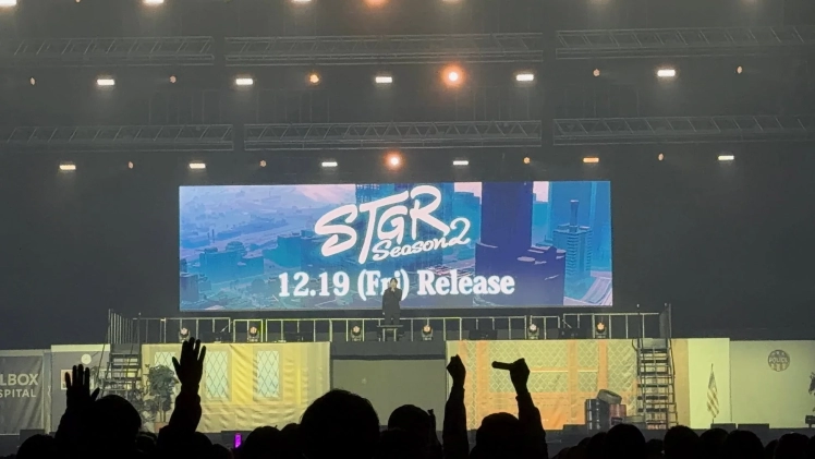 イベント会場でSTGR Season 2のリリースが発表されている様子