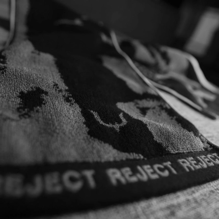 REJECT STANDARD TOWEL（ロゴ部分）